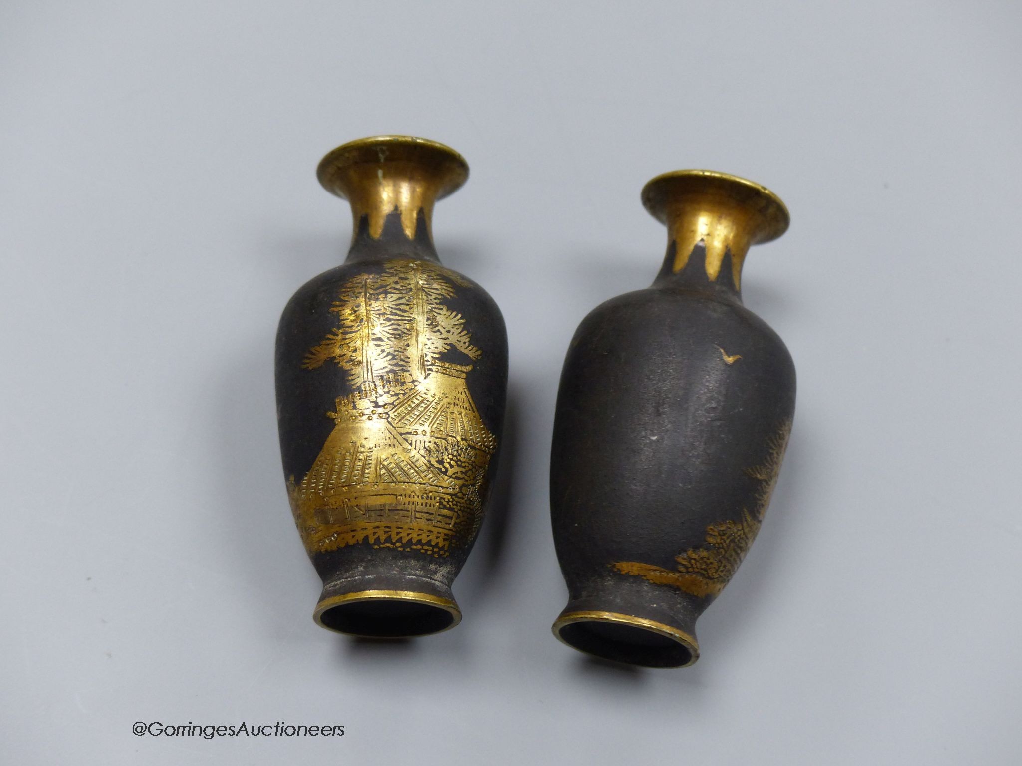 A pair of Japanese Komai style damascened iron miniature vases, height 6cm